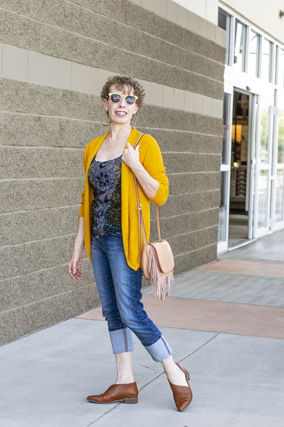 what color tops go with tan pants for women over 50