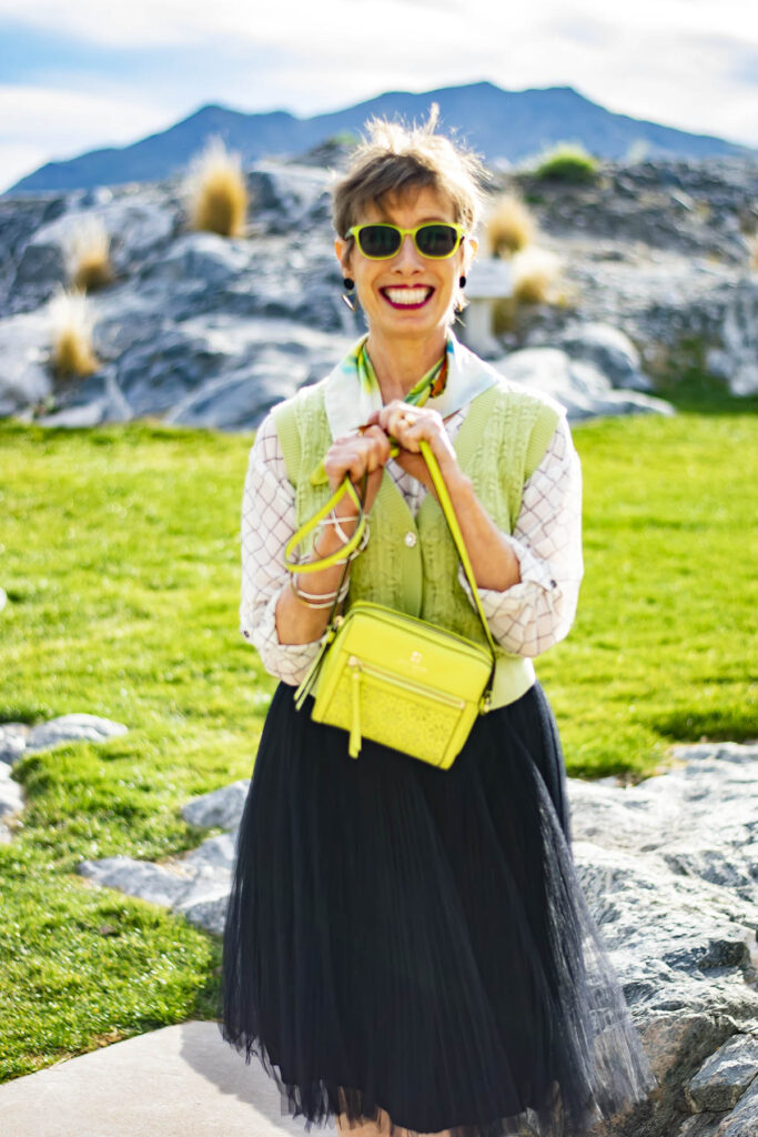 Lime green purse and sweater vest
