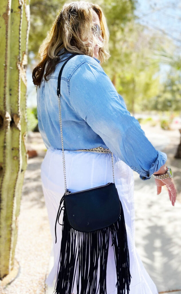 Black purse with white and blue
